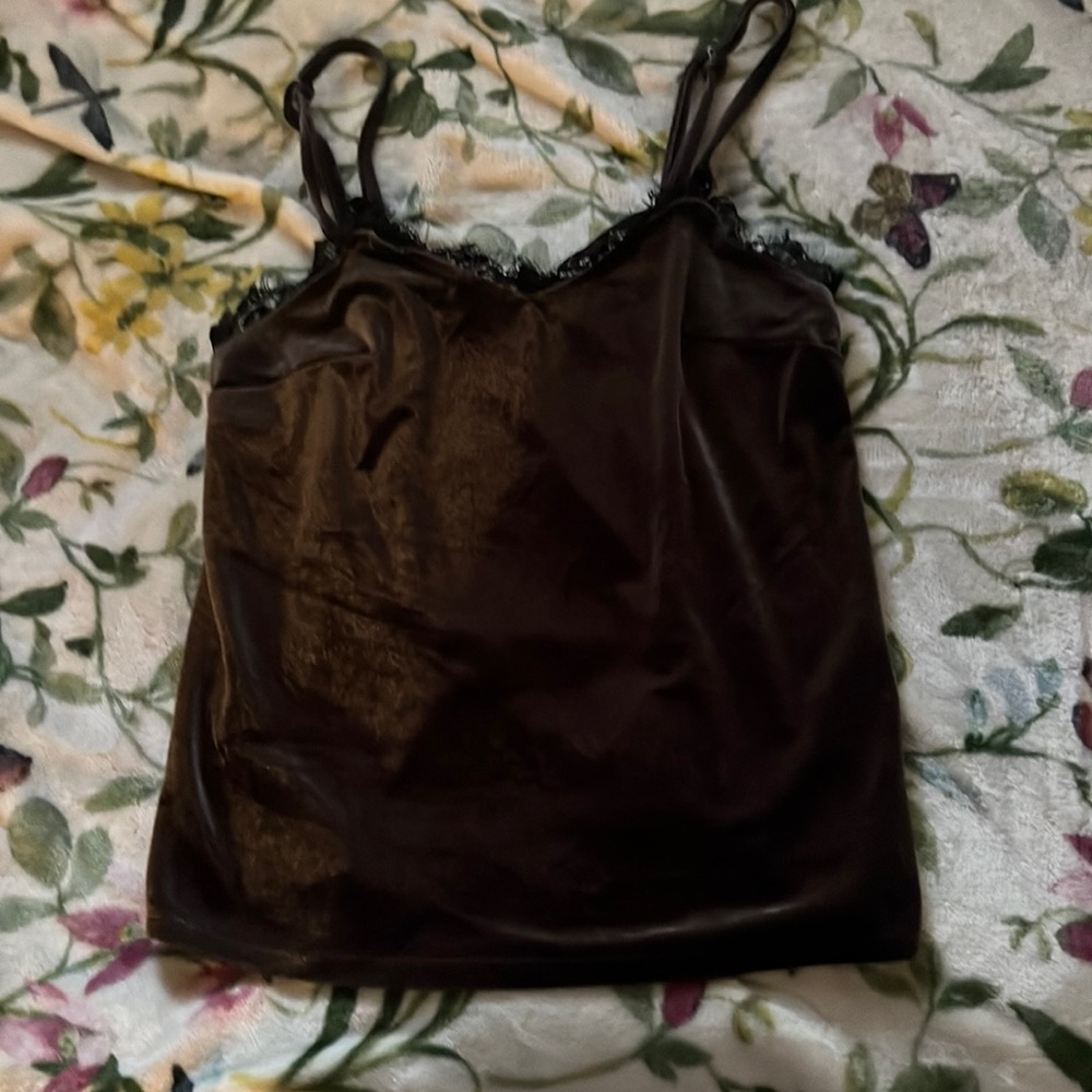 Cute black spaghetti strapped tank top. Laced at the top.